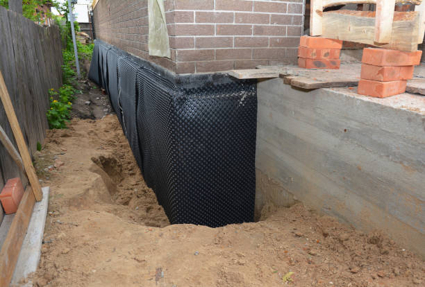 SJ Waterproofing Pros technician performing targeted Waterproofing assessment in Bel Air, MD